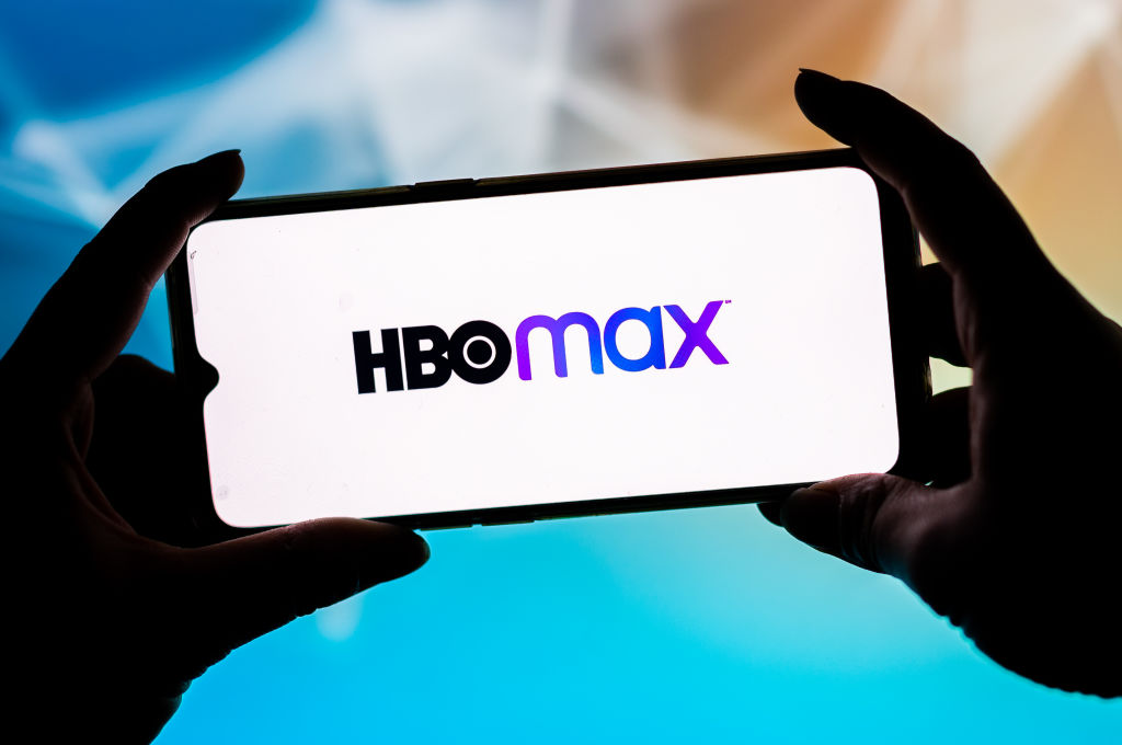 In this photo illustration a HBO Max logo seen displayed on...