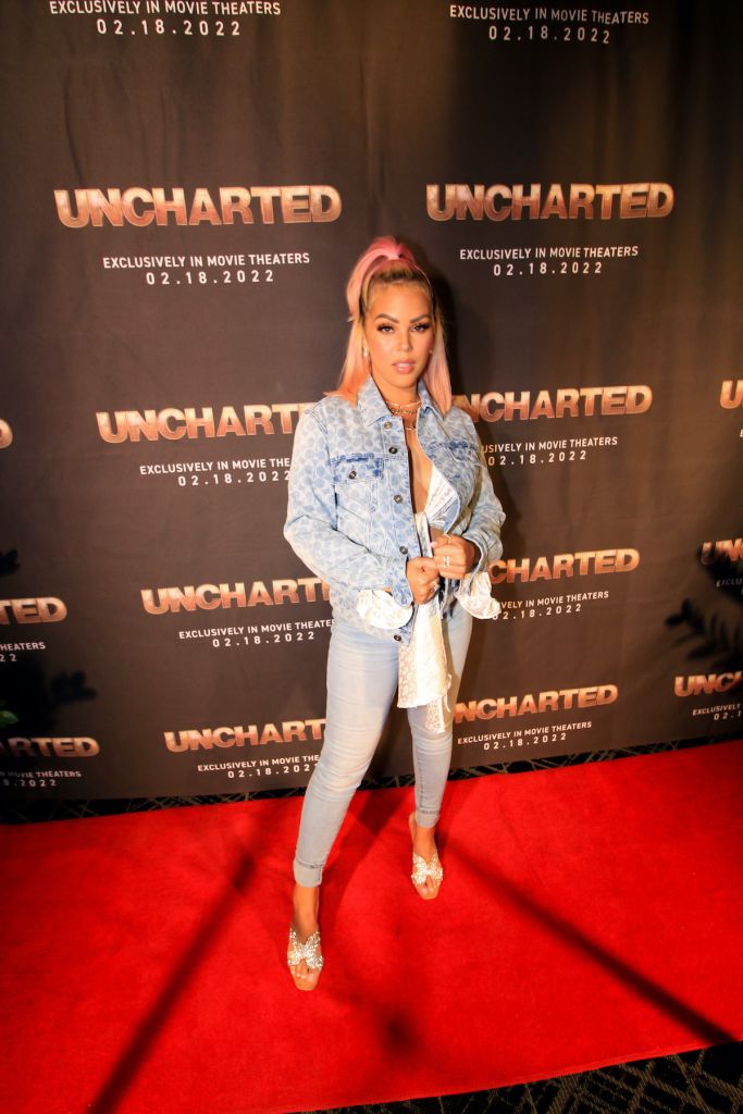 DC Young Fly and Ms Jacky Oh attend screening for Uncharted at iPic Theater in Colony Square