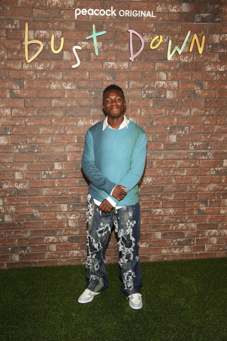 Olly Sholotan Posed In Blue