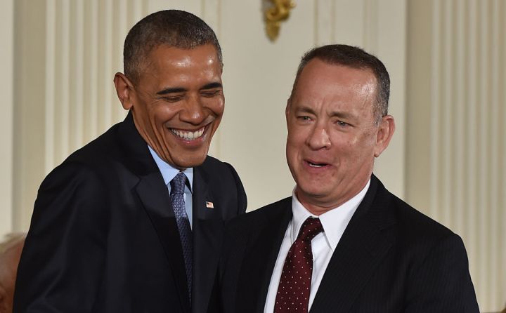 Happily Handing Out Medals to Tom Hanks