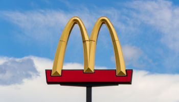 The McDonald's logo is seen above the restaurant in...