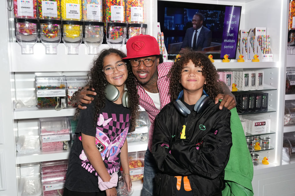 Natti Natasha & Nick Cannon Host Sugar Factory In Times Square