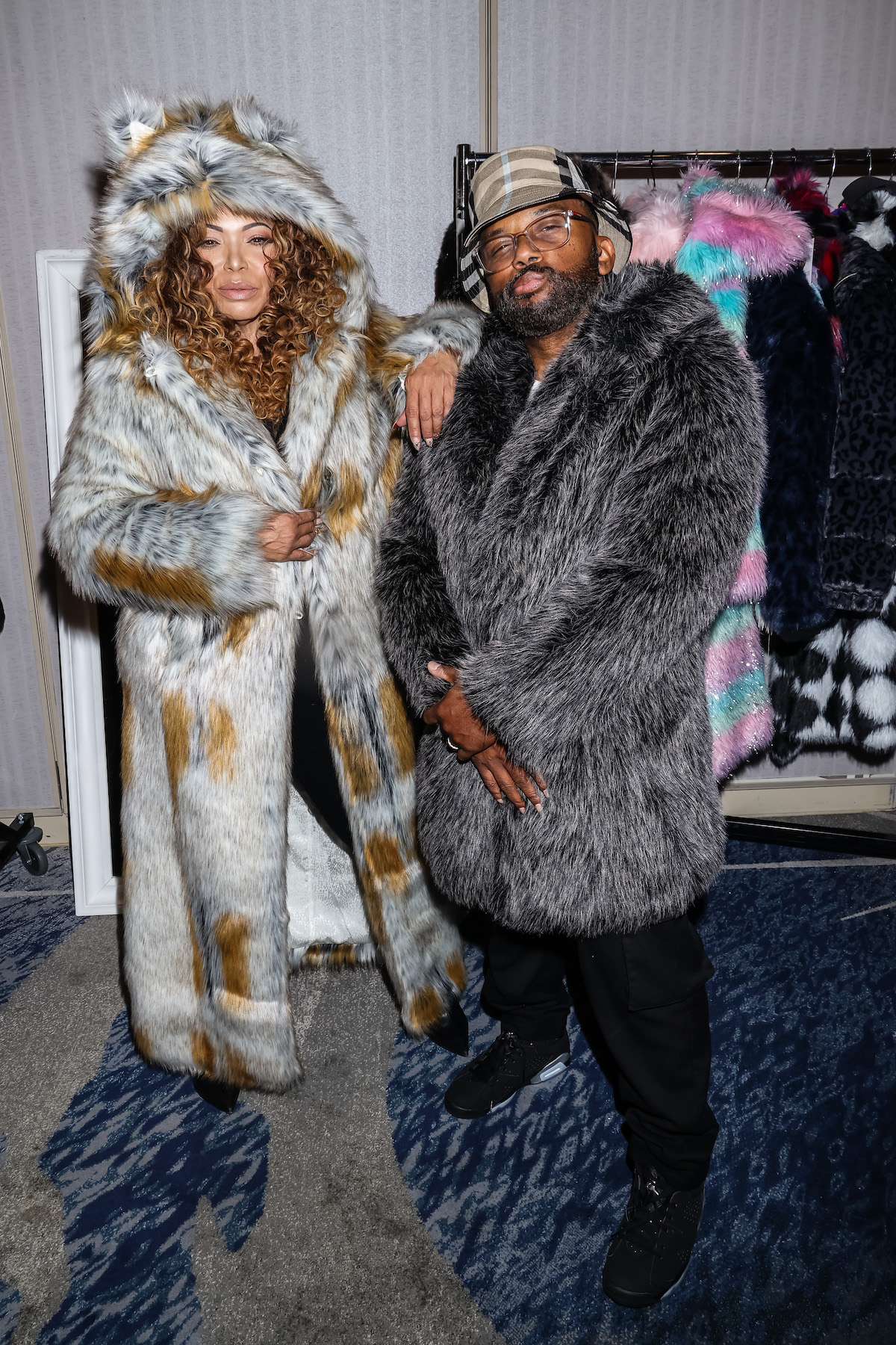 Tisha Campbell and Carl Anthony Payne II visit the Backstage Creations Gifting Suite benefitting the Television Academy Foundation for the 75th Emmy Awards