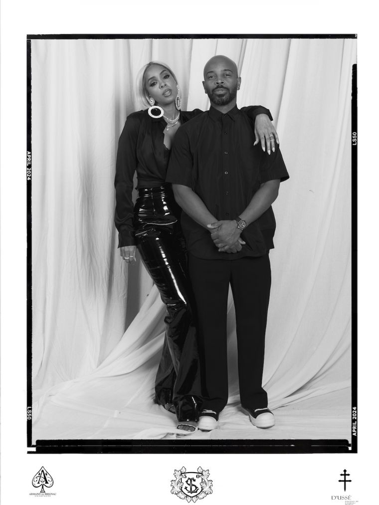 Kelly Rowland and Tim Weatherspoon