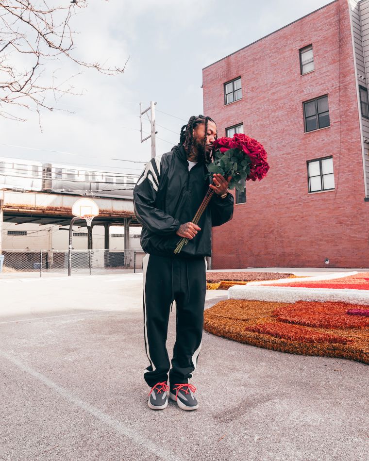 Getting His Flowers While He Can Smell Them