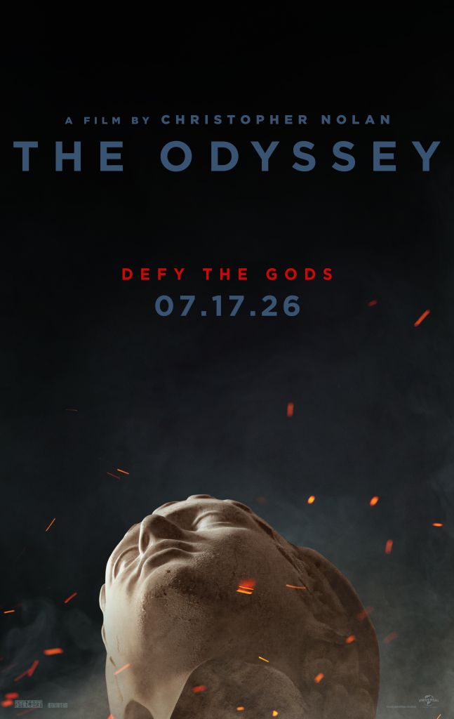 A dark film poster for "The Odyssey" directed by Christopher Nolan, with the text "DEFY THE GODS 07.17.26" and a close-up of a human face with glowing embers around it.